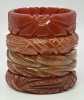 BB105 carved russet bakelite bangles